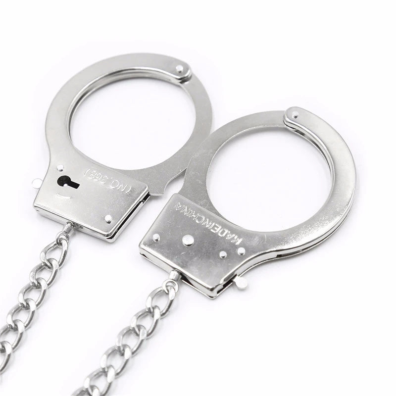 Dual Stimulation Metal Handcuffs with Attached Anal Plug